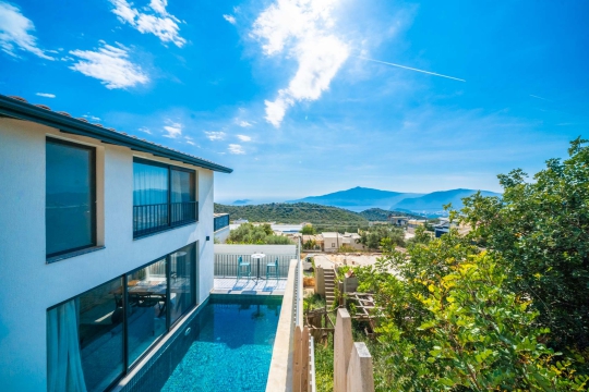 BLUE 8250 Kalkan Bezirgan'da 4 Kişilik Kiralık Tatil Villası